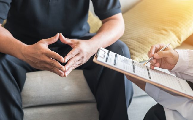 man consulting a doctor