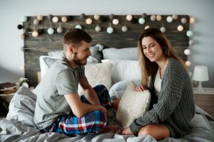 couple talking in bed