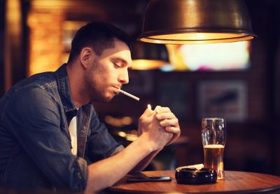 smoking and drinking in a pub