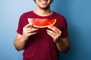 happy with a slice of watermelon