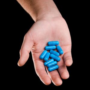 handful of supplement pills